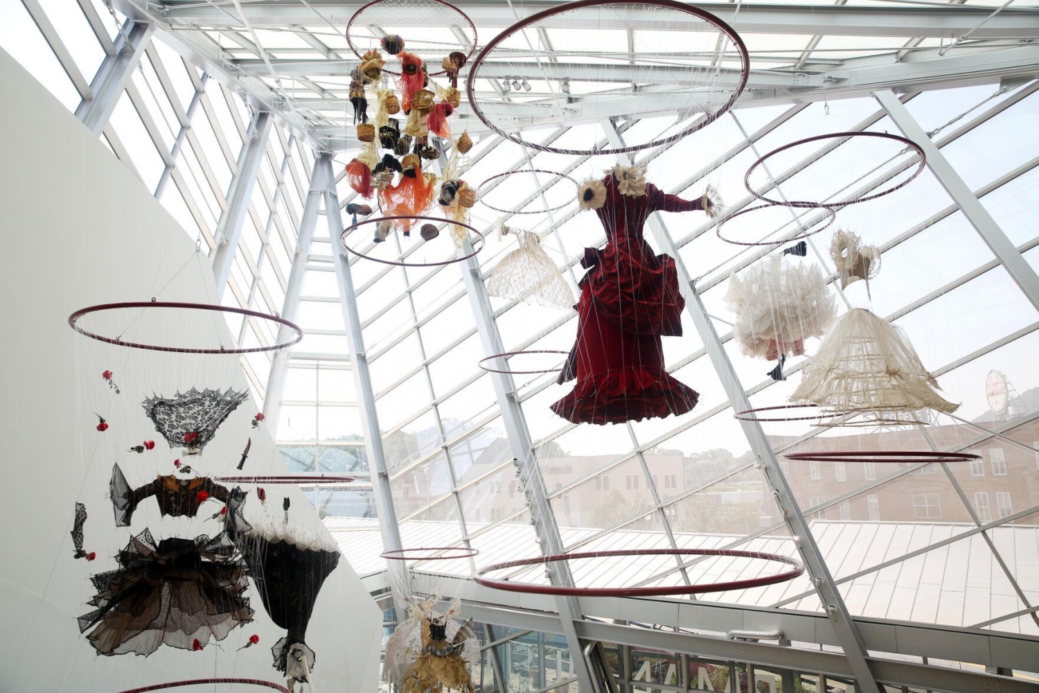 A new exhibit hangs in the Taubman Museum of Art atrium with repurposed costumes from the New York City Opera. Artist E.V. Day&rsquo;s &ldquo;Divas Ascending&rdquo; includes sculptures representing iconic women from well-known operas., Photos, Heather Rousseau, The Roanoke Times