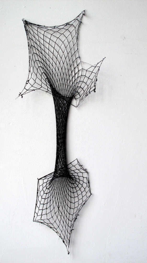 Wet Black Hole,&nbsp;Black polyester, cotton fishnet stocking and resin.&nbsp;31 x 13 inches