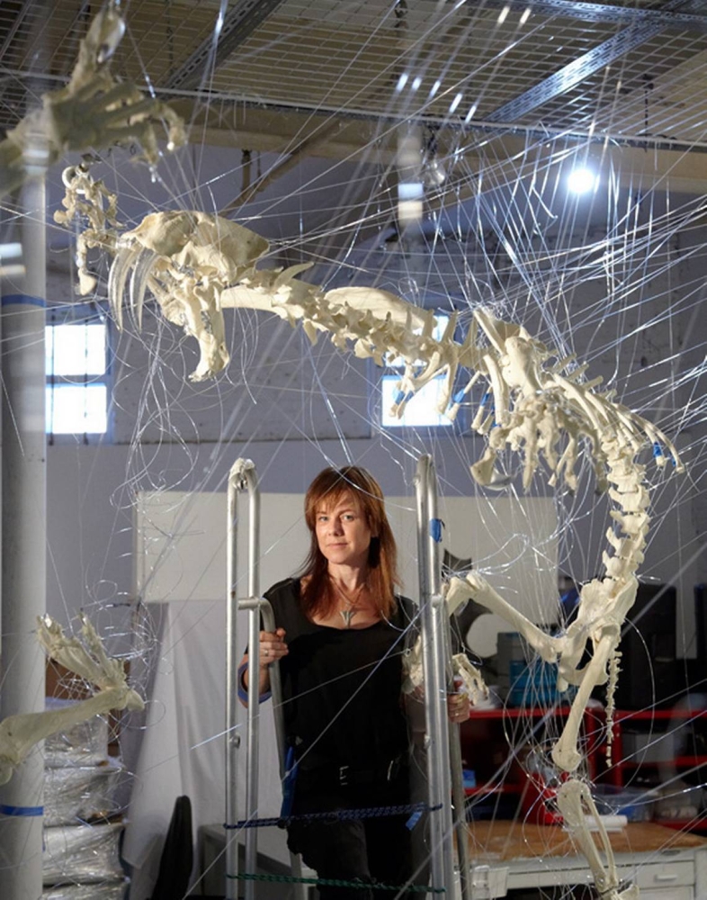 Brooklyn, New York, artist E.V. Day, with her art installation, &ldquo;Cat Fight with Two Sabertoothed Skeletons.&rdquo; Day also created &ldquo;Daytona Vortex&rdquo; out of an old Jimmie Johnson racing suit. Vincent Dilio